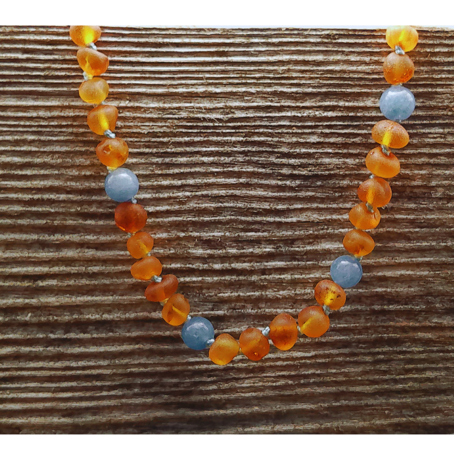 Bernsteinkette mit Aquamarin
